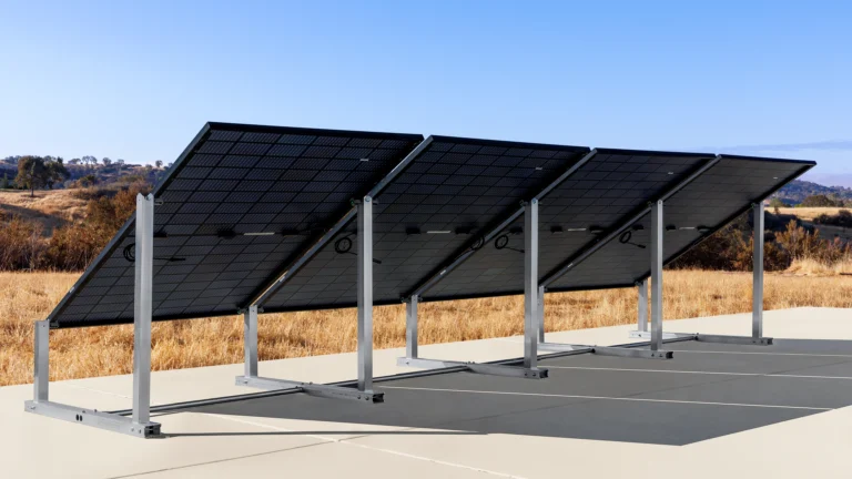 IntegraRack's IR-30 racking set up on concrete with all-black solar panels installed.