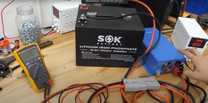 High quality image of a demo of Dexter charging a dead battery with an inverter-charger